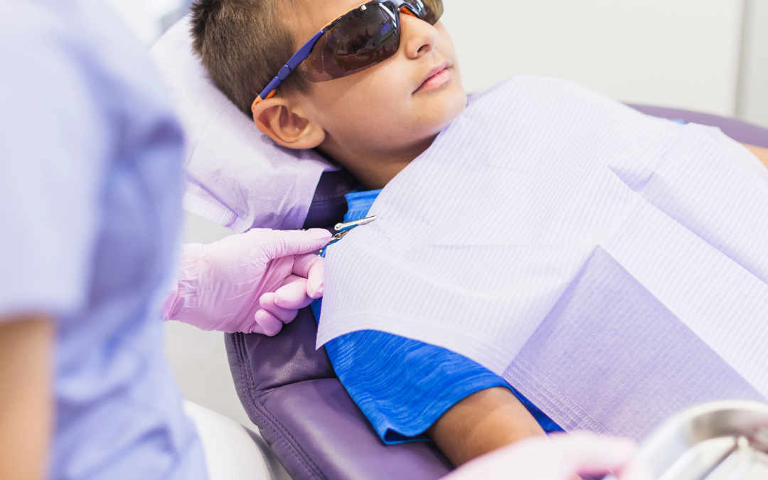 kid on a dentist's chair seeking emergency care