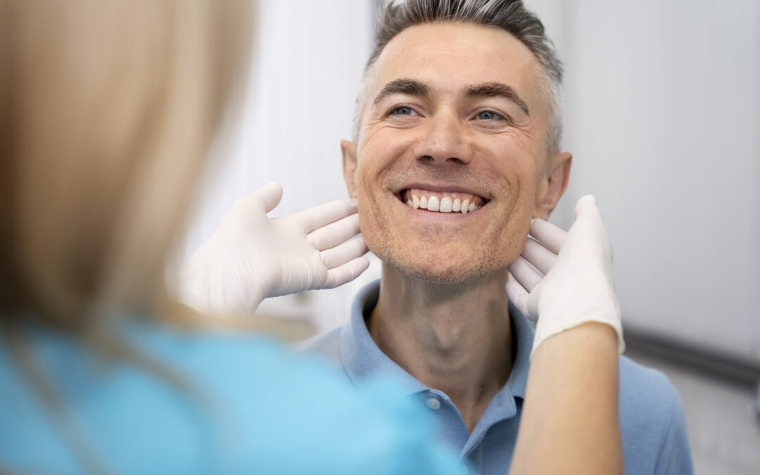 Dentist checking a patient's smile.